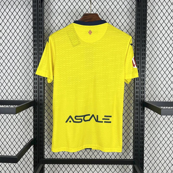 Maillot Villarreal Domicile 2025/2026, dos sur fond grillagé