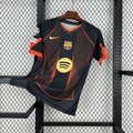 Schwarz-Oranges Konzepttrikot FC Barcelona 2025/2026