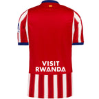 Maillot Atlético Madrid Domicile 2026/2027 vue arrière sur fond grillagé
