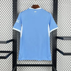 Maillot Manchester City Domicile 2026/2027 vue arrière sur fond grillagé